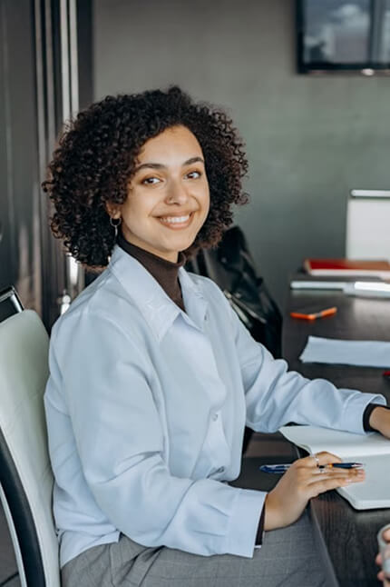 Perago team member working at a desk